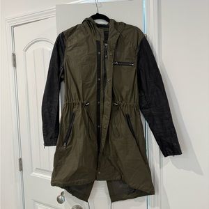 Army green and faux leather raincoat